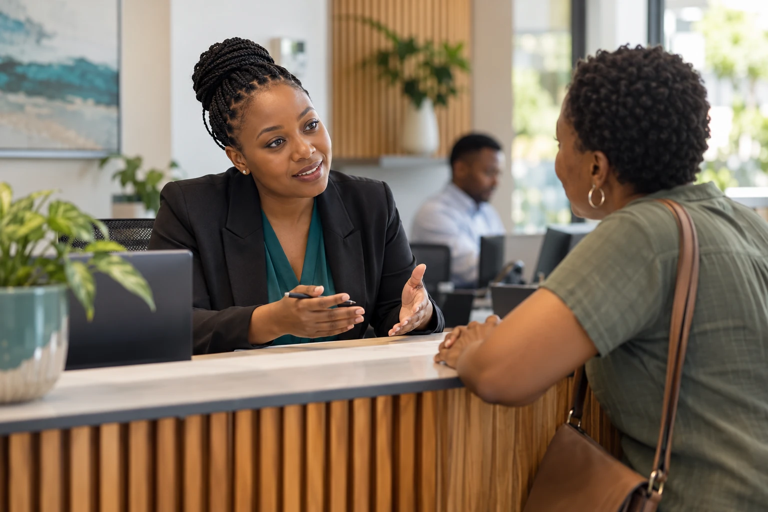 Customer-service professional listening to a customer and clarifying the next step